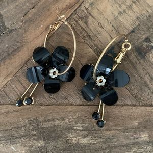 Earrings with flower and stud detail